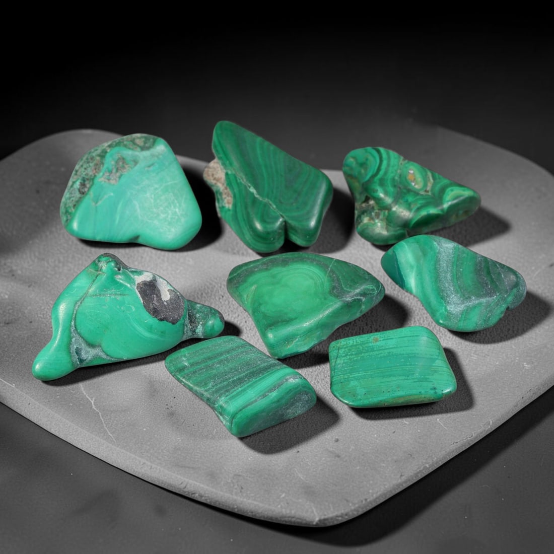 84.42 Carats Natural Banded Green Malachite Rough Parcel Lot, 24ZQ: This parcel of genuine natural malachite rough stones features characteristic concentric green banding formed through natural copper carbonate mineral formation. Each piece displays unique swirling la