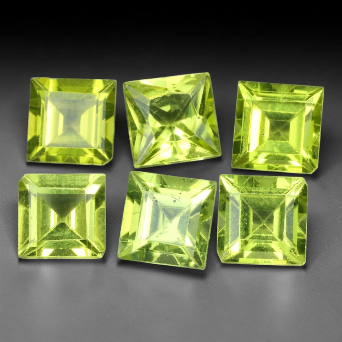 7.03ct Natural Peridot Square Faceted Parcel Loose Gemstone, 100XX: Matching parcel of hand faceted natural peridot gemstones featuring vibrant consistent lime-green body tone with subtle natural internal mineral characteristics visible throughout each stone. Every ge