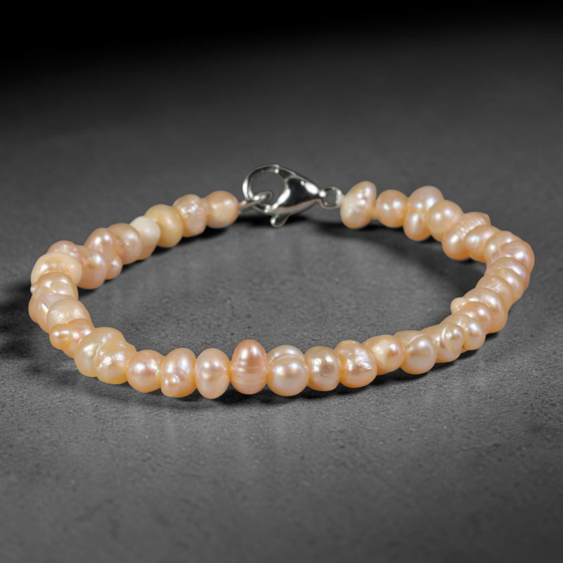 Natural Freshwater Pearl Bracelet - Tiny Baroque Champagne Pearl Strand, 82YM: Handcrafted from miniature organic baroque natural freshwater pearls with soft warm champagne pearlescent luster, each bead bearing delicate uneven rounded shapes characteristic of naturally cultivate