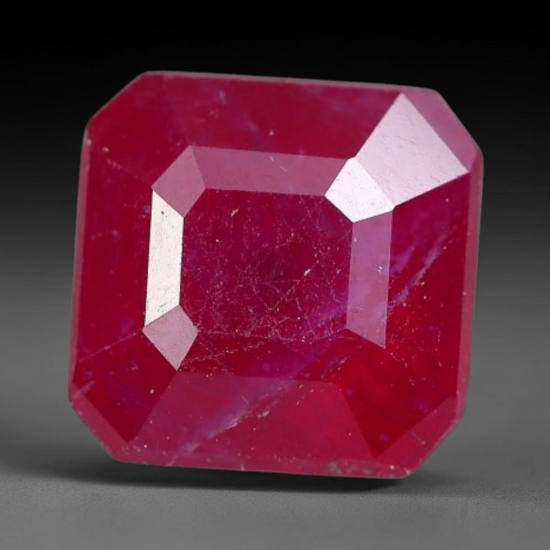 2.29 Carats Natural Madagascar Ruby Square Cushion Cut Loose Gemstone, 71XM: This natural Madagascar ruby is crafted into a square cushion modified step cut, displaying vivid saturated crimson red color typical of Malagasy corundum. Fine scattered mineral inclusions, subtle in