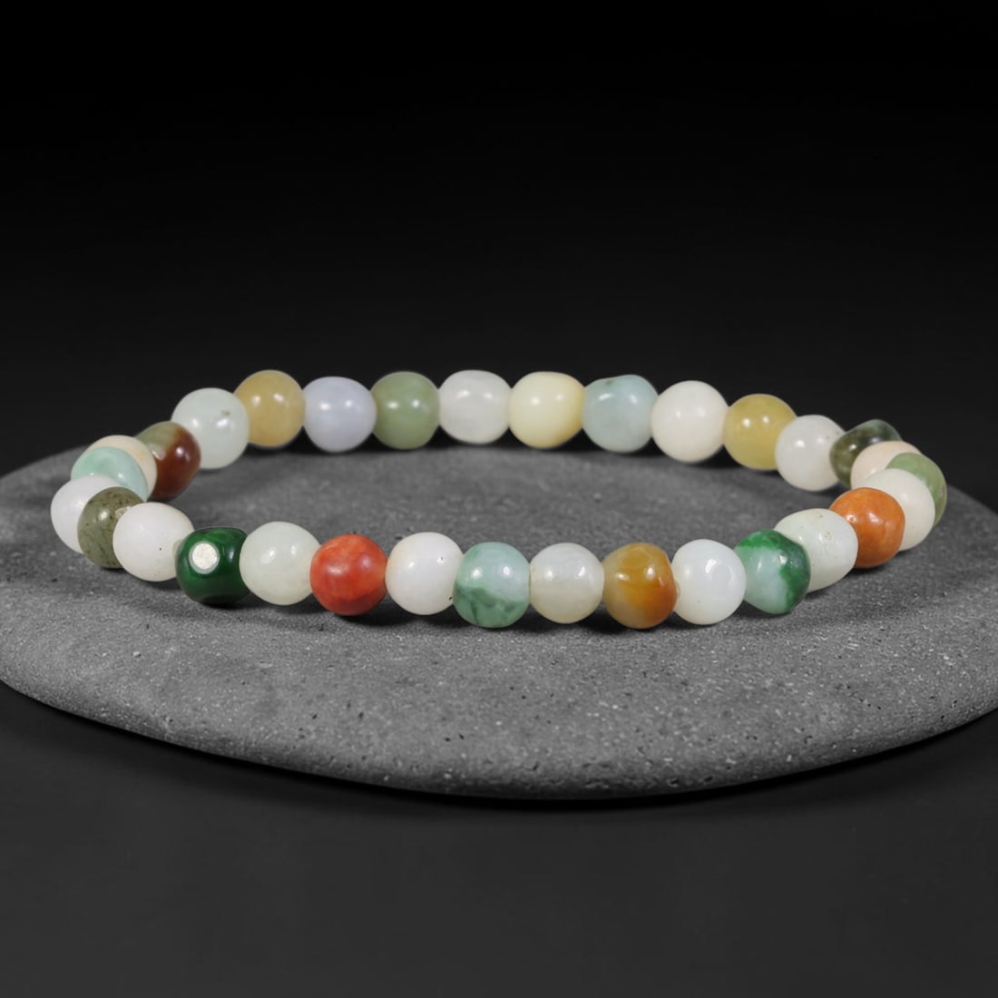 Natural Burmese Type A Multi-Colour Jadeite Jade Beaded Bracelet, 32TA: Strung from untreated natural Burmese Type A jadeite jade spherical beads with maximum bead dimension of 6.32mm, this bracelet strand features a sleek smooth polished finish showcasing mixed pale gree