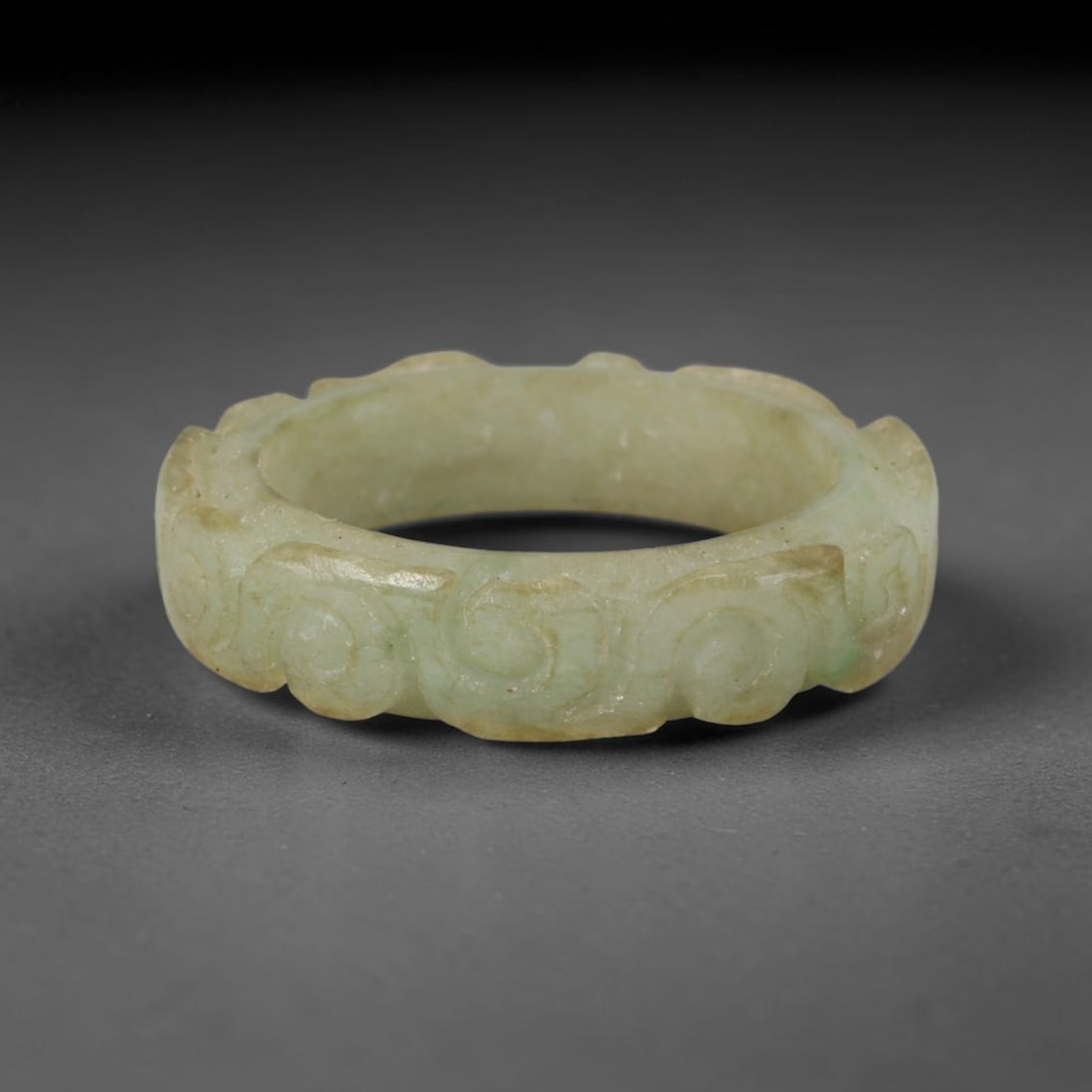 Natural Burmese Type A Jadeite Jade Carving Band Ring Size US 11.5, 11TB: Carved from untreated natural Burmese Type A jadeite jade, this carved stone band holds a soft polished finish showcasing milky pale base hues interspersed with warm natural brown mineral patina patch