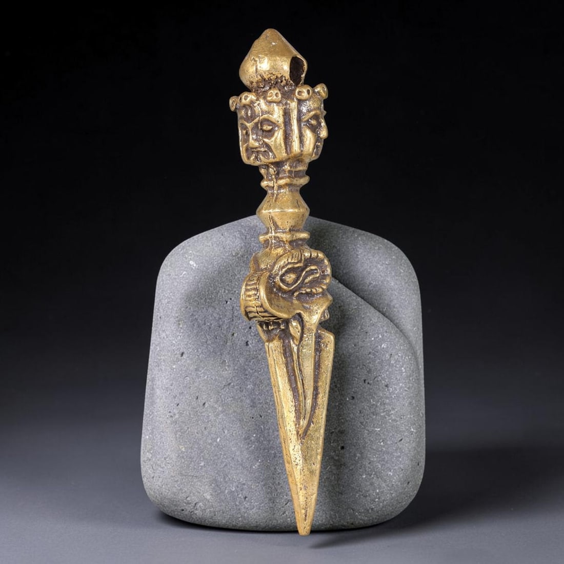 Thai Vintage Copper Alloy Triple Face Phurba Ritual Dagger Amulet Pendant, 100YY: Vintage Thai copper alloy tantric phurba dagger amulet, dimension 5.7x1.3cm. Expertly hand-carved with triple skull faces at the apex, intricate mythical creature relief detail and a sharp triangular 