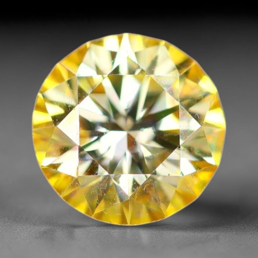 0.90 Carats Yellow Moissanite Loose Gemstone, 32WP: This yellow moissanite features dimensions of 6.5x3.8mm, crafted from high performance silicon carbide material famous for exceptional light refraction and brilliant light dispersion that creates inte