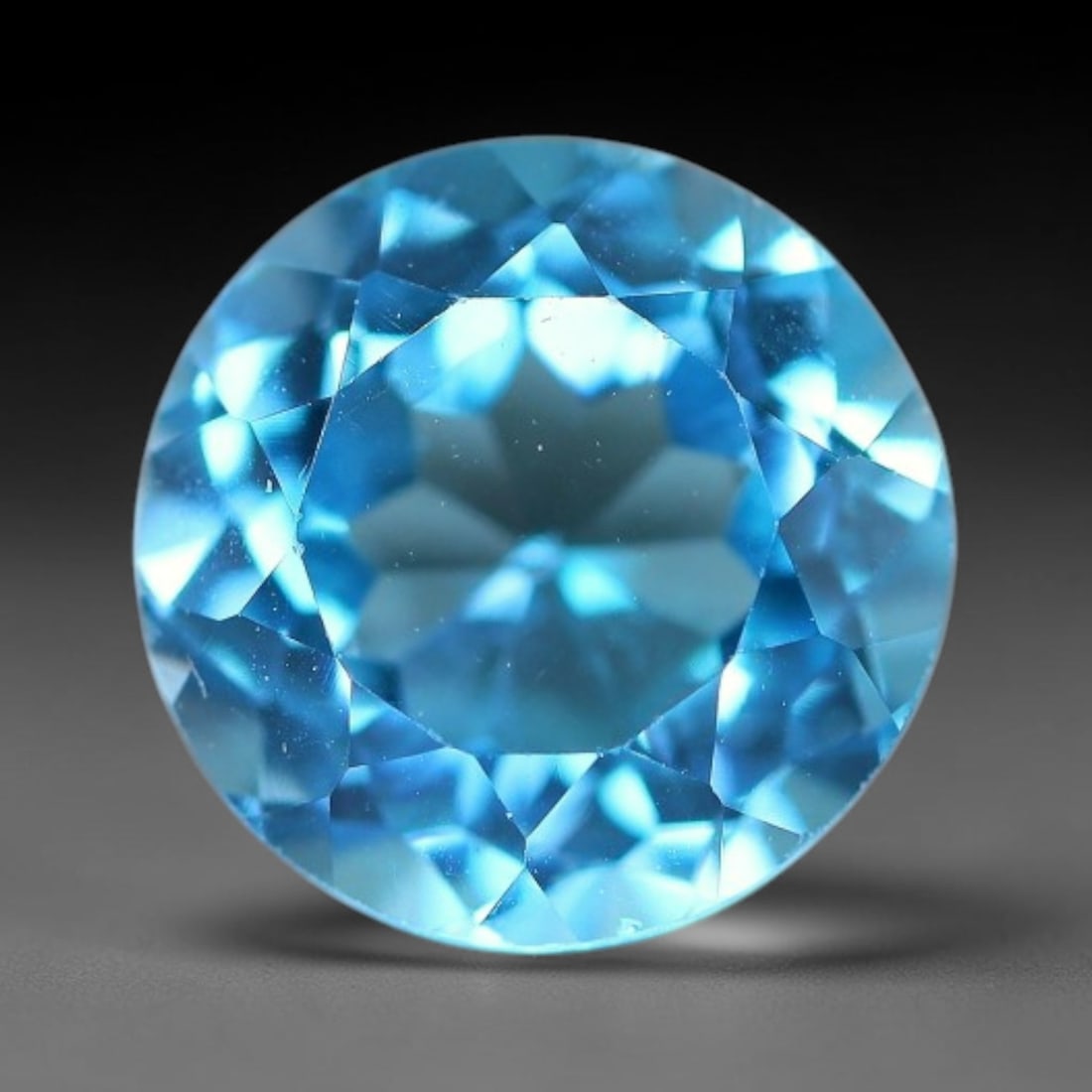 2.85 Carats Natural Swiss Blue Topaz Loose Gemstone, 12WP: This genuine natural swiss blue topaz displays consistent saturated blue coloration inherent to unprocessed natural mineral specimens. Formed through natural geological formation, the stone carries su