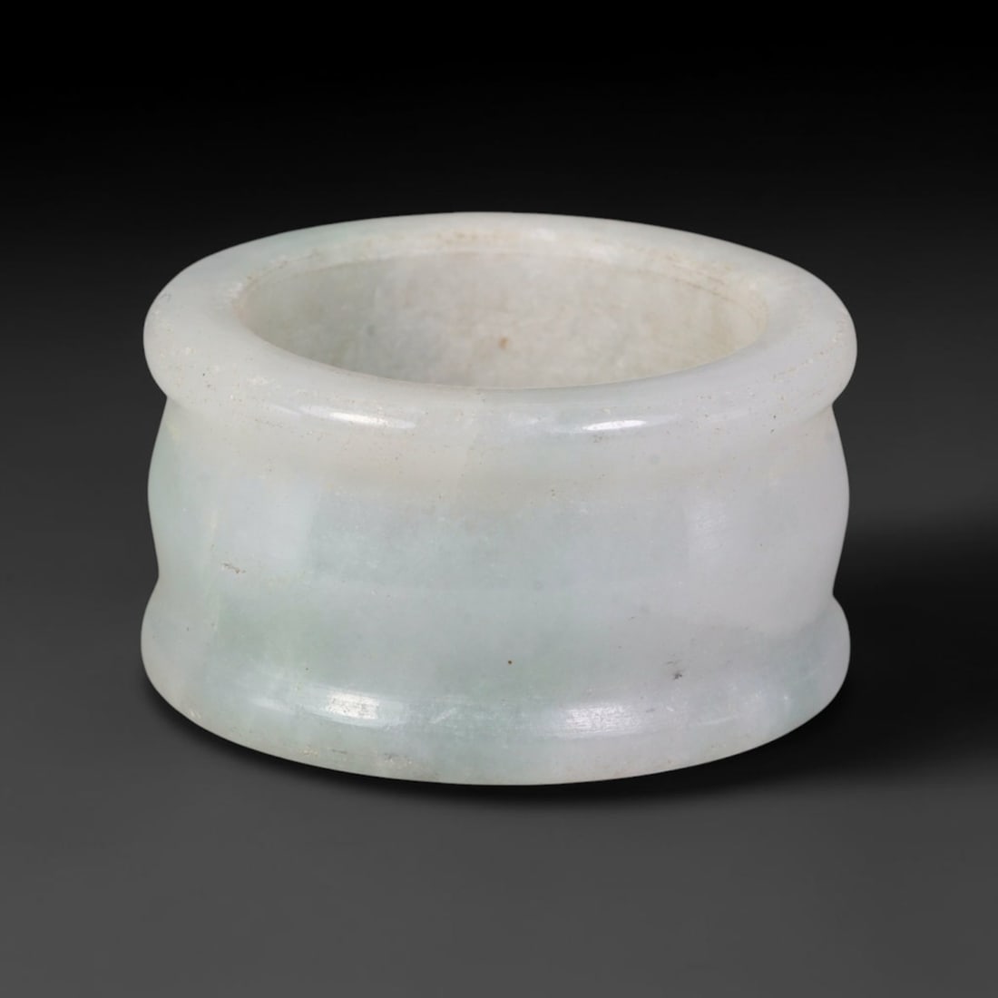 Natural Burmese Type A Jadeite Jade Band Ring Size US 9.75, 8TB: Fashioned from untreated natural Burmese Type A jadeite jade, this solid stone band carries a smooth polished finish showcasing milky pale base tones blended with soft natural green mineral undertones