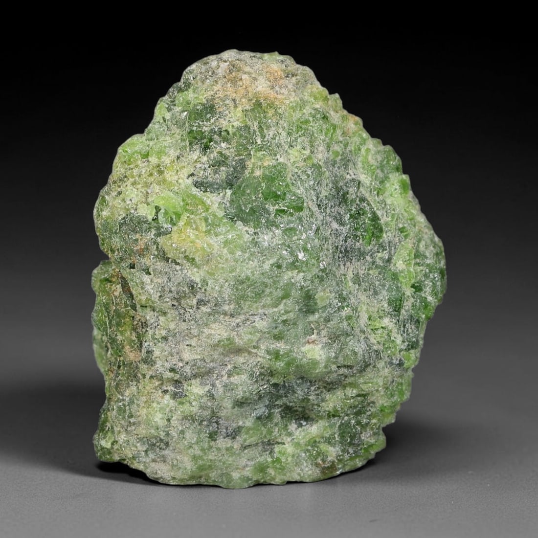 55 Carats Natural Vibrant Green Chrome Diopside Rough Specimen, 33YS: This is an untreated natural chrome diopside mineral specimen formed through natural geological processes, displaying rich green coloration caused by chromium content within its crystalline structure.