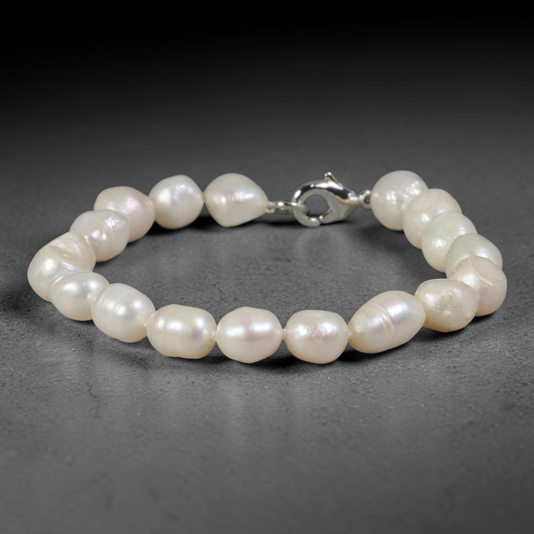 Natural Freshwater Pearl Bracelet - Baroque Glossy Pearl Strand, 77YM: Hand-strung medium organic baroque natural freshwater pearls with luminous glossy pearlescent luster, each bead showcasing distinct asymmetrical freeform oval and rounded silhouettes formed through na