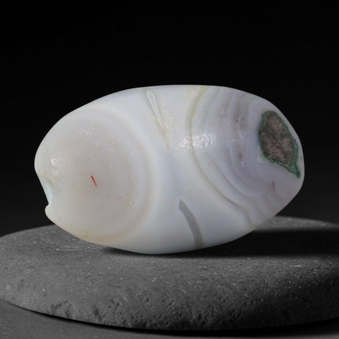 Ancient Parthian Persian Empire Banded Agate Barrel Bead (247 BCE - 224 CE), 79XD: This antique barrel-shaped banded agate bead originates from the Parthian Persian Empire, a major Central and West Asian power renowned for fine chalcedony talismans traded along the Silk Road for nob