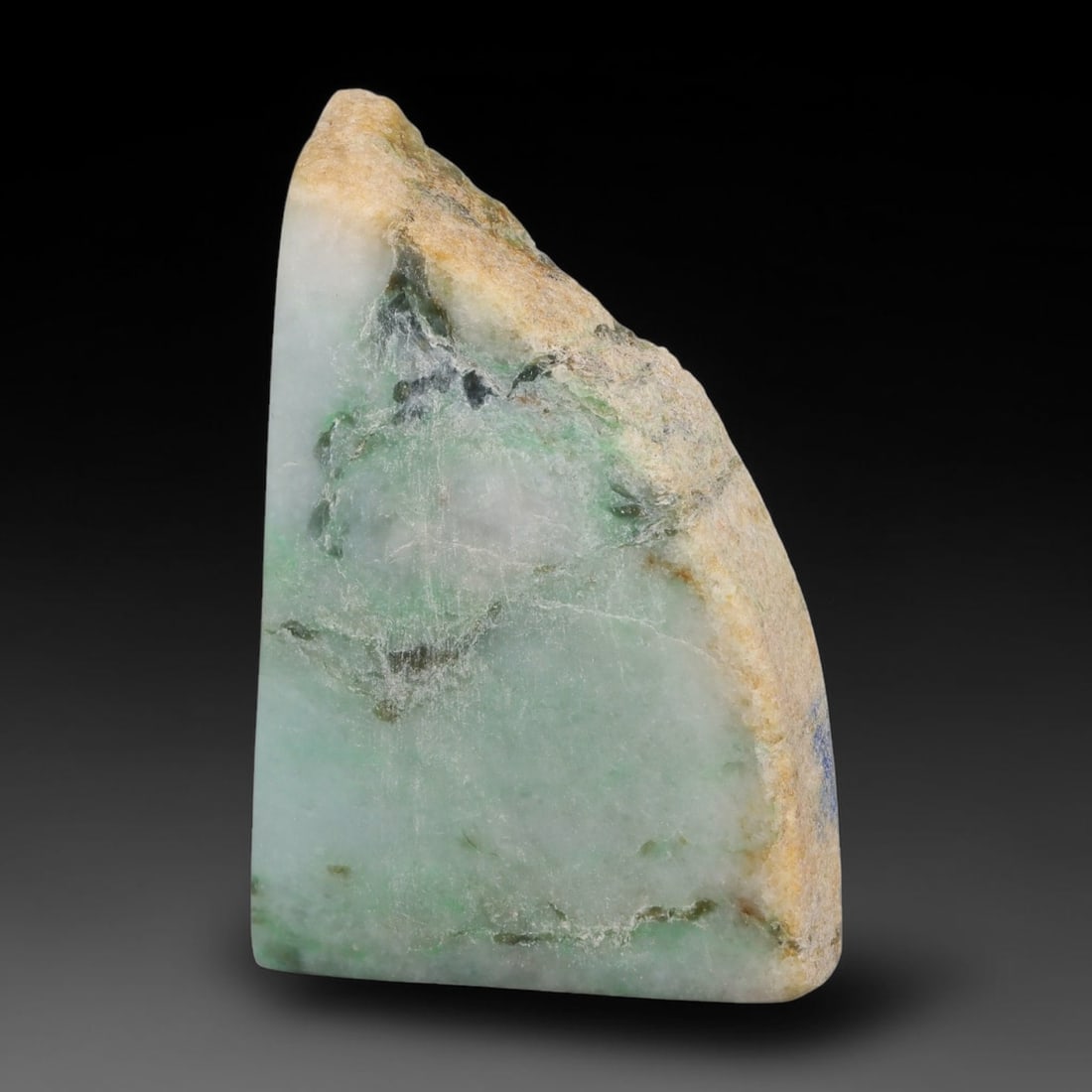 310ct Natural Type A Burmese Jadeite Jade Sliced Rough, 26YR: This specimen is a sliced rough block of natural Type A Burmese jadeite jade. The interior displays natural colour zoning with visible mineral veining and crystalline patterns typical of unprocessed j