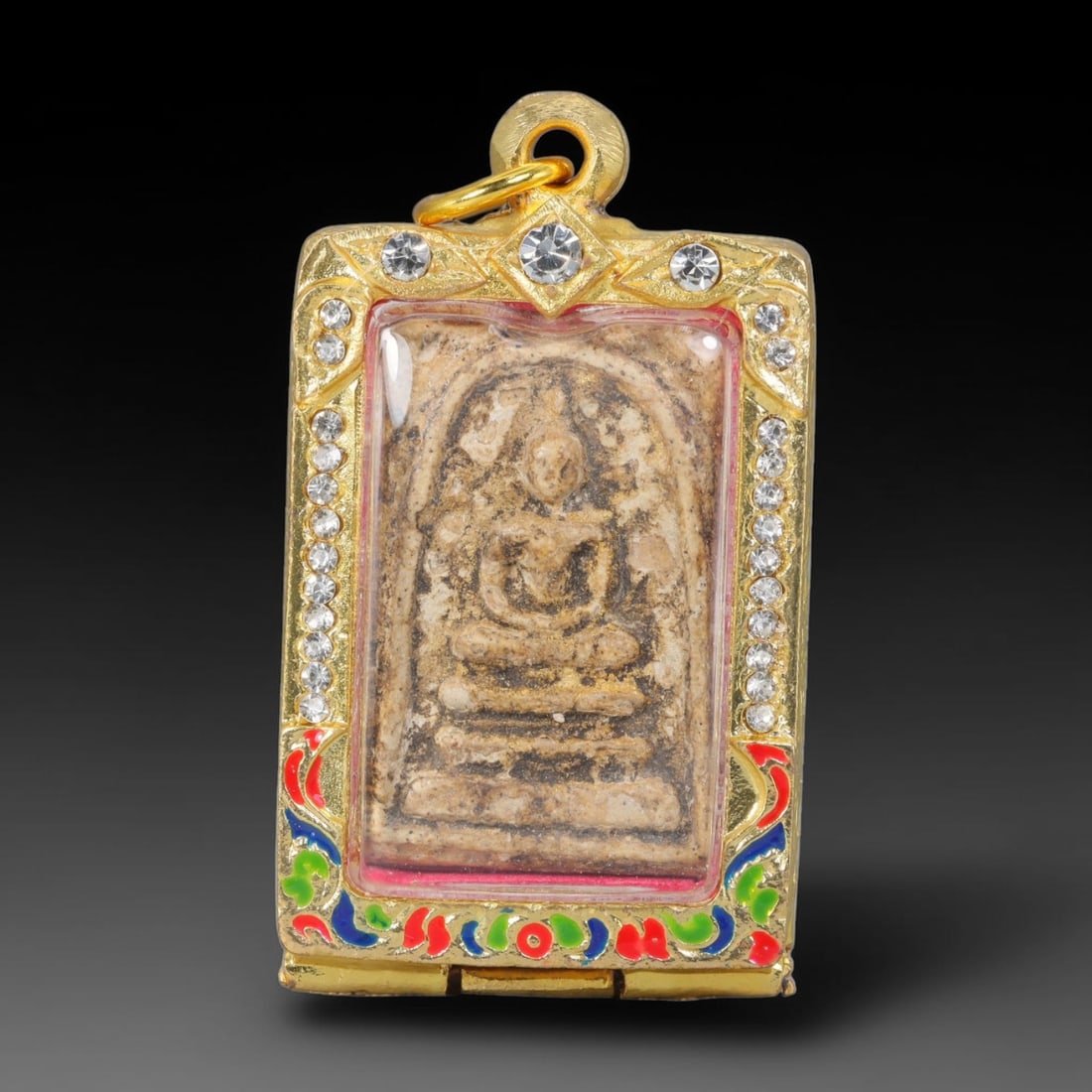Thai Gilded Clay Metal Amulet Buddhist Votive Pendant, 17ZB: Constructed from fired clay with light gilded finishing layers, the piece uses traditional molded crafting techniques typical of Southeast Asian devotional artifacts. Its rectangular form follows stan