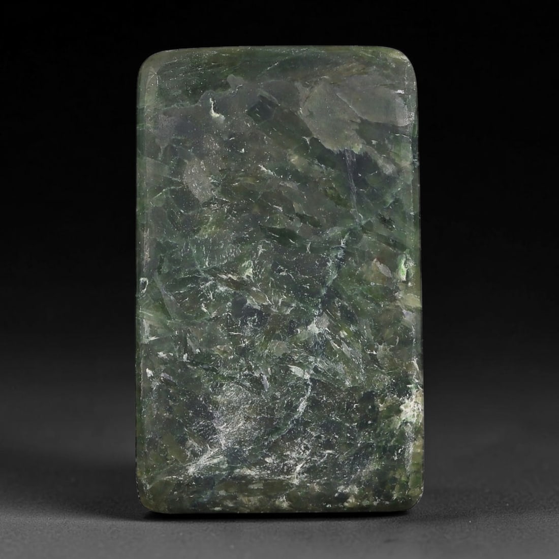 160ct Natural Type A Burmese Jadeite Jade Sliced Rough, 55YR: This specimen is a sliced rough block of natural Type A Burmese jadeite jade. The interior displays natural colour zoning with visible mineral veining and crystalline patterns typical of unprocessed j