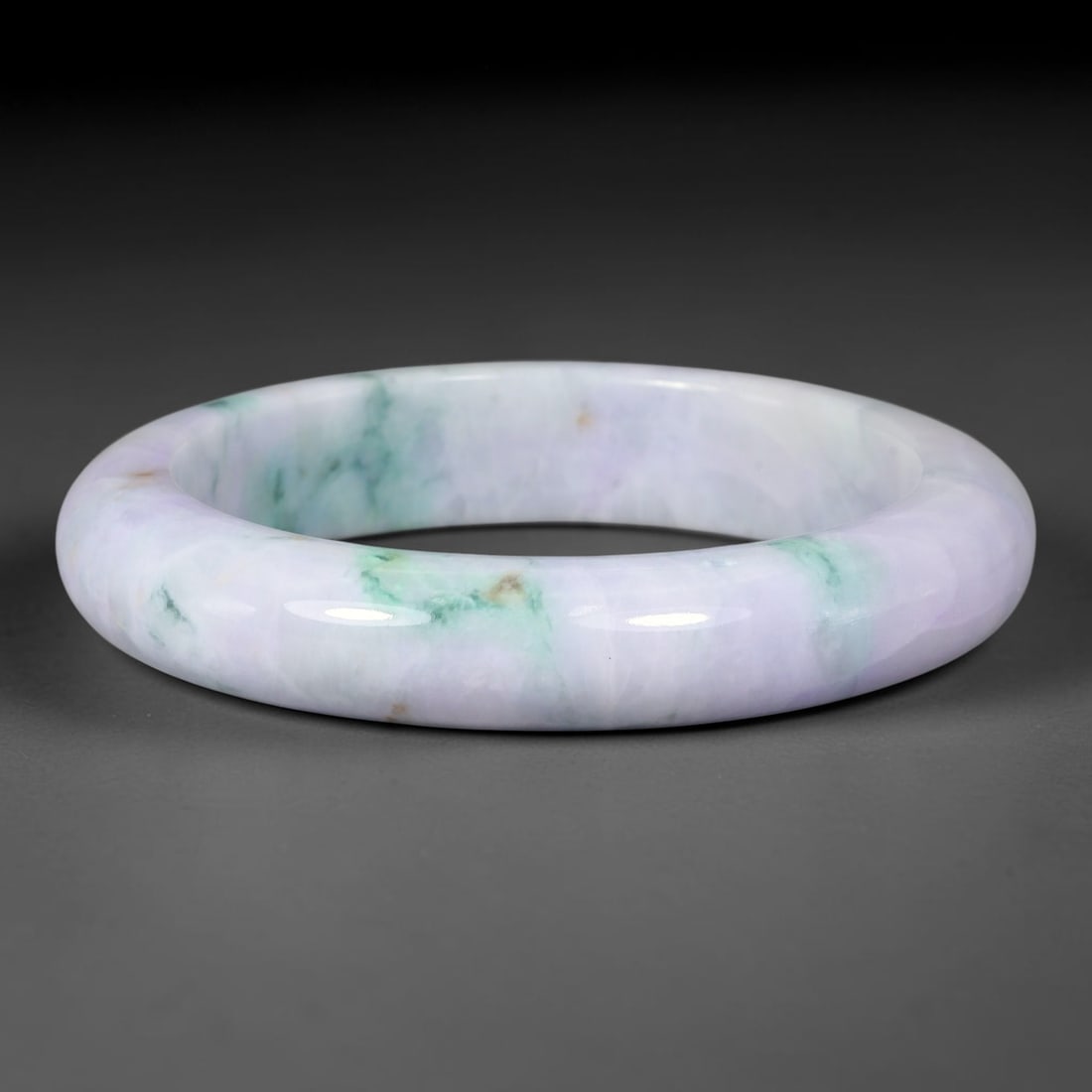 Natural Burmese Type A Lavender Floating Green Jadeite Jade Bangle Bracelet, 45TD: Genuine Burmese Type A jadeite jade bangle, smooth polished surface with delicate lavender base adorned with vivid floating green streaks and tiny warm speckles. Inner diameter 57mm, band width 13mm. 