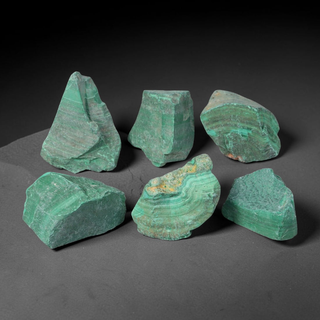 500ct Natural Malachite Rough Raw Mineral Specimen, 55YT: Formed through natural geological mineralization processes, this unpolished malachite rough displays inherent textural layering developed over prolonged underground formation cycles. The material reta