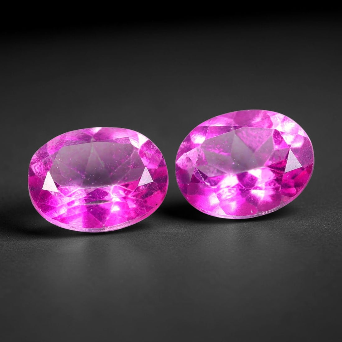 4.52ct Natural Pink Topaz Oval Cut Matched Pair Loose Gemstones, 97TG: Natural pink topaz fashioned into a matched pair of oval mixed cuts with polished table and well-defined pavilion facets. The stones display a saturated vivid hot pink body color with good transparenc