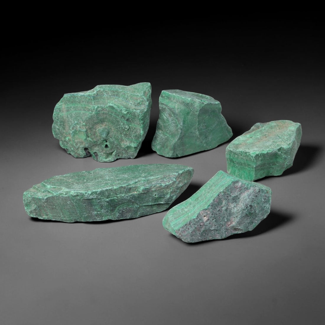 425ct Natural Malachite Rough Raw Mineral Specimen, 57YT: Formed through natural geological mineralization processes, this unpolished malachite rough displays inherent textural layering developed over prolonged underground formation cycles. The material reta