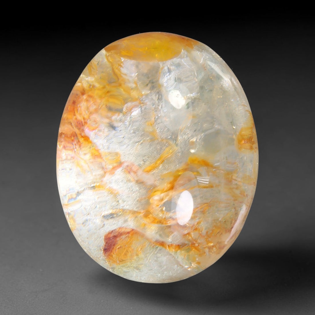 23.27ct Natural Brazilian Phantom Quartz Oval Cabochon Loose Gemstone, 81YX: This smoothly polished cabochon of natural phantom quartz preserves delicate layered phantom crystal formations enclosed inside transparent quartz host. The domed polished surface offers unobstructed 