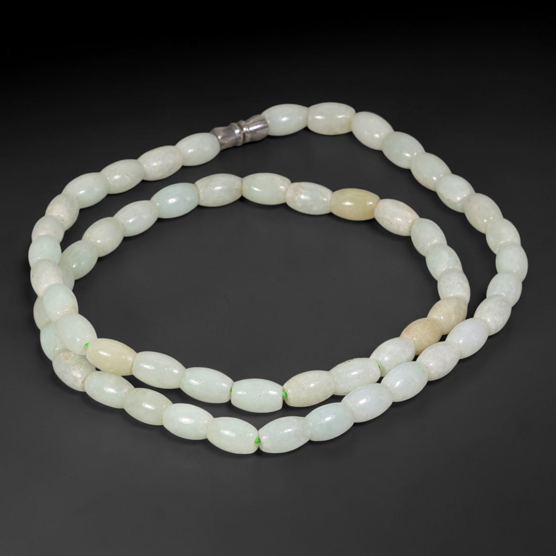 Natural Burmese Type A Pale White Oval Rice Jadeite Bead Necklace, 13TF: Smooth oval rice-shaped natural Burmese Type A jadeite beads measuring 6mm, predominantly pale milky white interspersed with subtle warm honey-yellow accents and gentle natural tonal variations. Equip
