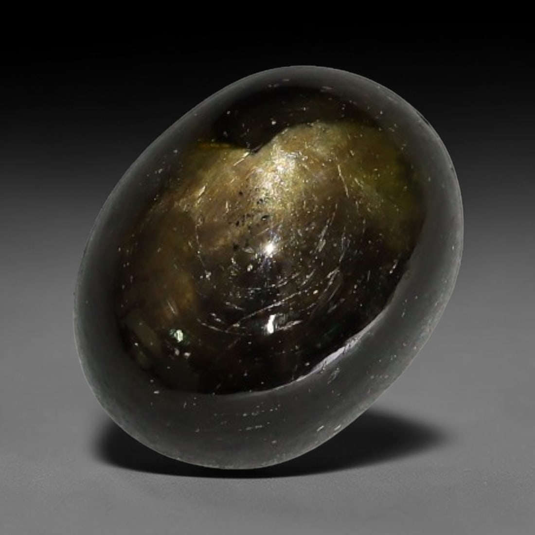 5.17ct Natural Siamese 6-Ray Black Star Sapphire Loose Gemstone, 52WW: This polished star sapphire originates from classic Siamese mining deposits, featuring a deep dark crystalline base with fine native mineral traces trapped within its structure, sized at calibrated 10