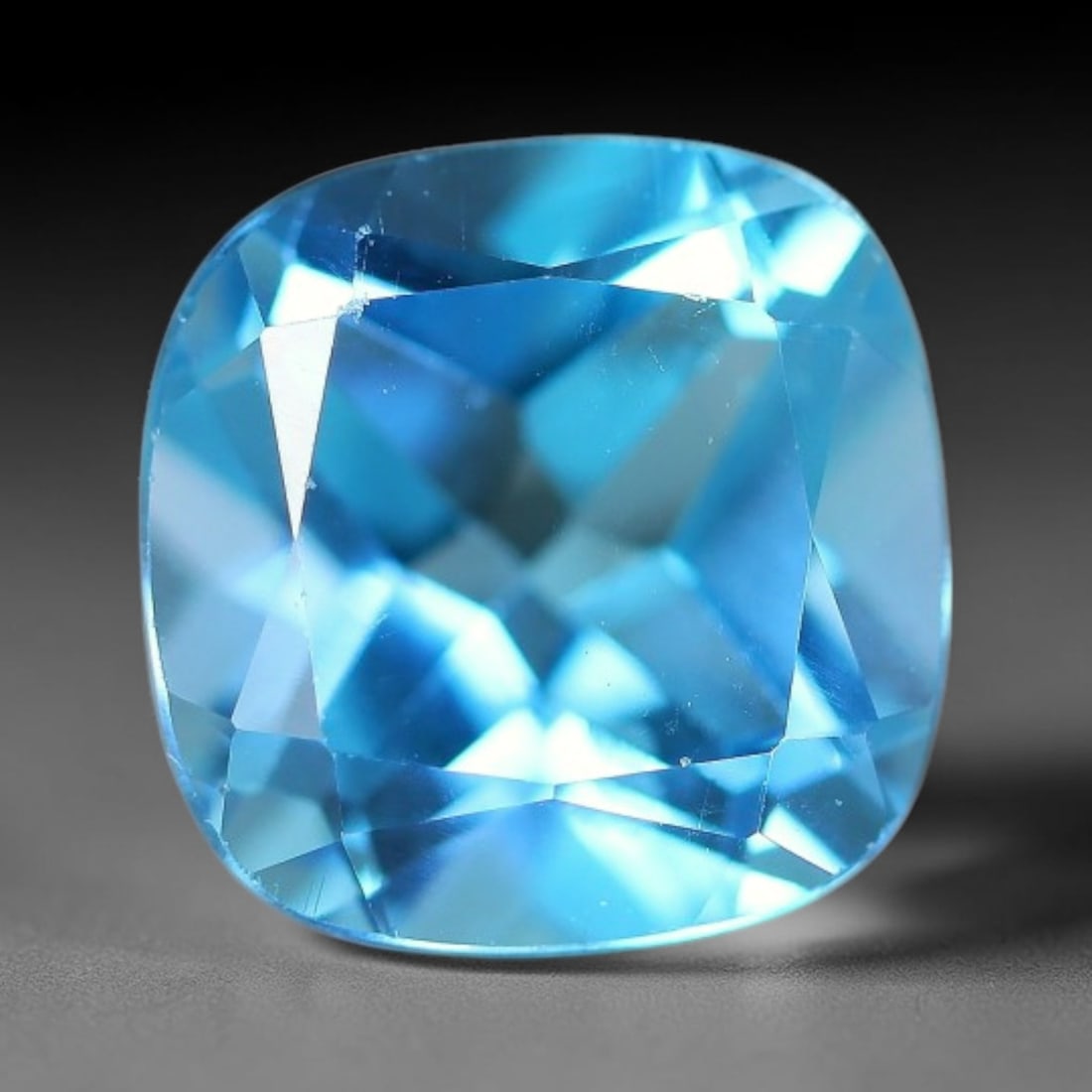 3.44 Carats Natural Swiss Blue Topaz Loose Gemstone, 8WP: This genuine natural swiss blue topaz displays consistent saturated blue coloration inherent to unprocessed natural mineral specimens. Formed through natural geological formation, the stone carries su