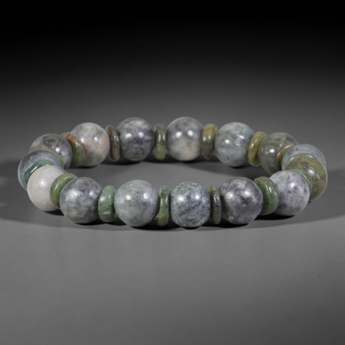 Natural Burmese Type A Grey Ink Jadeite Bracelet with Multi-Tone Jade Disc Spacers, 53TA: Handcrafted from fully untreated authentic Burmese Type A natural Type A jadeite, this bracelet features smooth round grey ink jade main beads paired with alternating pale green, olive and yellowish j