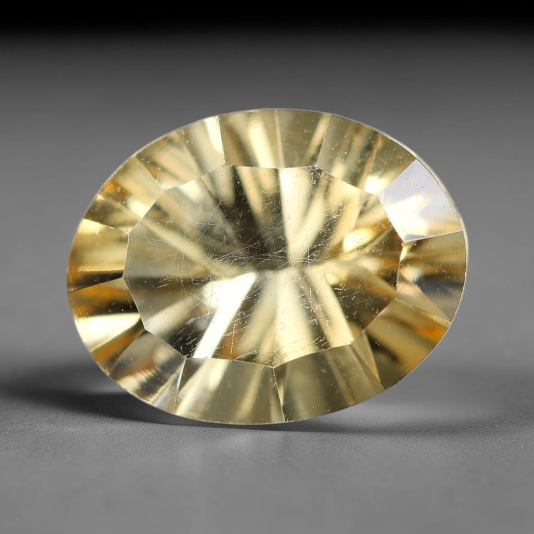 1.81 Carats Natural Golden Citrine Oval Faceted Gemstone, 43XZ: Come take a look at this bright single oval citrine with a warm honey-gold tone that really glows under light. This faceted stone weighs 1.81 carats total, measuring 9.3x5.0x3.2mm. It holds a rich, so