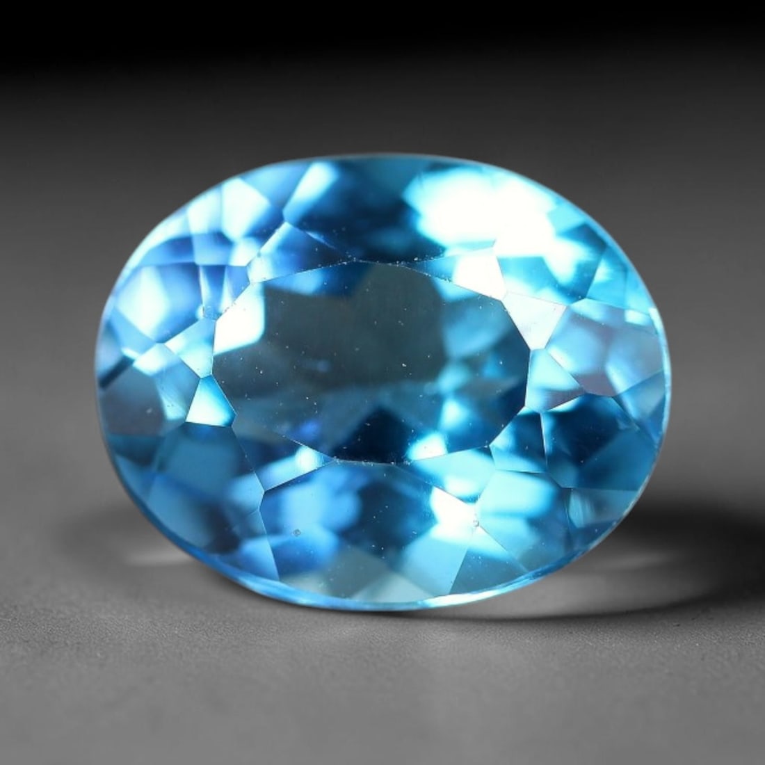 4.13 Carats Natural Swiss Blue Topaz Loose Gemstone, 99WJ: This genuine natural swiss blue topaz displays consistent saturated blue coloration inherent to unprocessed natural mineral specimens. Formed through natural geological formation, the stone carries su