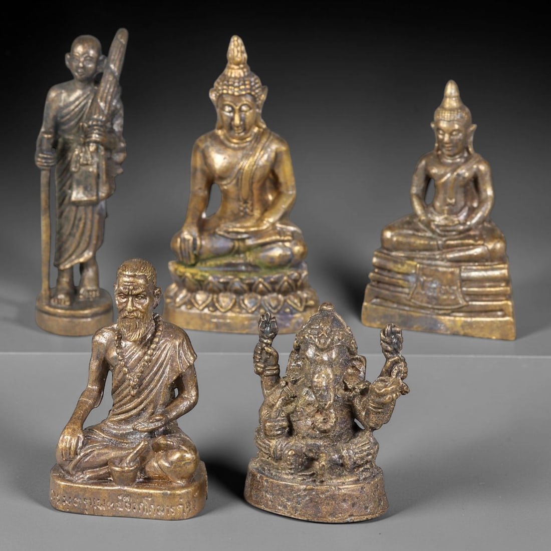 Thai Vintage Copper Alloy Mixed Buddha Hermit & Ganesha Mini Statues - 5pcs Set, 2YZ: Vintage Thai copper alloy miniature spiritual figurine set of five pieces, each sized 3.5x2.0cm. This set features a standing pilgrimage monk with staff, two distinct seated meditation Buddha statues 