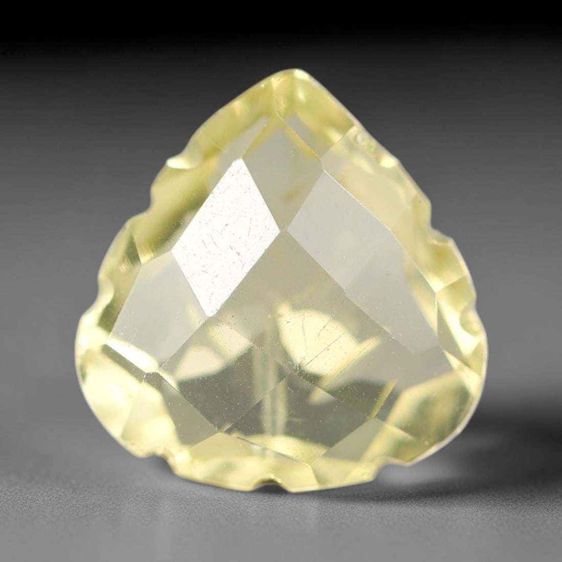 7.60 Carats Natural Brazilian Lemon Quartz Fancy Cut Loose Gemstone, 87WY: This lemon quartz specimen is mined from Brazilian natural quartz deposits and refined via professional fancy cut lapidary work, featuring consistent polished surfaces across the entire crystalline ex