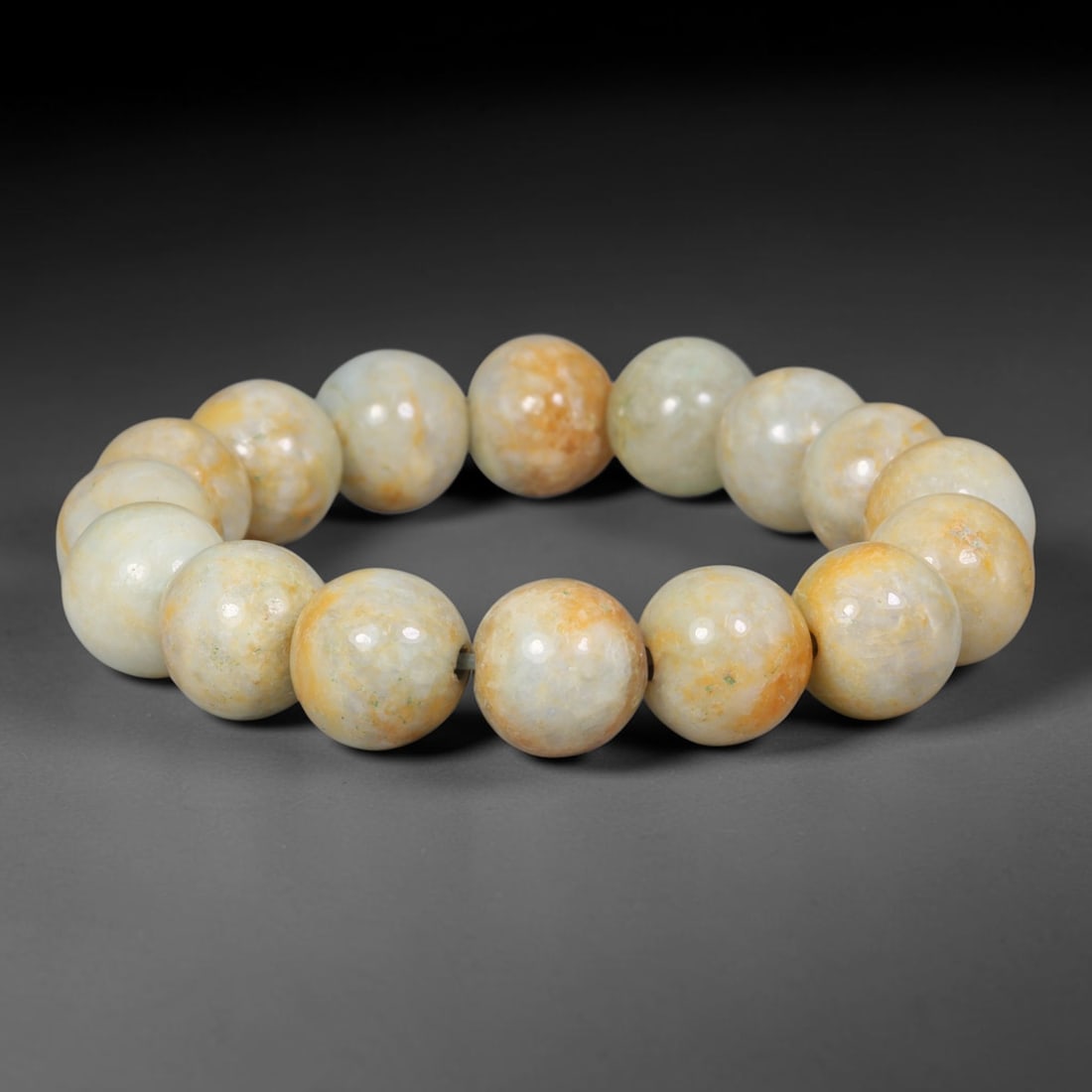 Natural Burmese Type A Milky White with Natural Golden Russet Jadeite Jade Beaded Bracelet, 83TA: Crafted from fully untreated authentic Burmese Type A jadeite, this bracelet features large smoothly polished round beads with a creamy milky white base naturally overlaid with warm golden russet oran