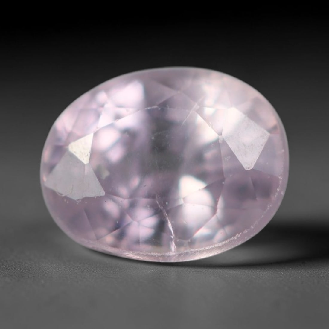 0.45 Carats Natural Soft Pale Lavender Pink Sapphire Loose Faceted Gemstone, 30XM: Natural delicate pale lavender-pink corundum sapphire finely oval faceted loose gemstone, brilliant mixed facets create soft diffused light sparkle and showcase a faint translucent pastel lilac-pink h