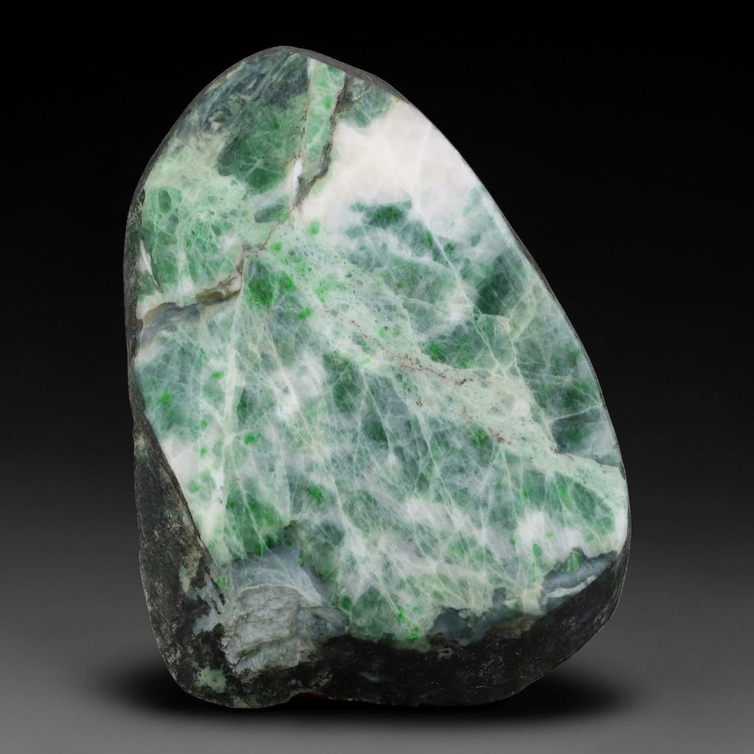 395ct Natural Type A Burmese Jadeite Jade Sliced Rough, 11YK: This specimen is a sliced rough block of natural Type A Burmese jadeite jade. The interior displays natural colour zoning with visible mineral veining and crystalline patterns typical of unprocessed j