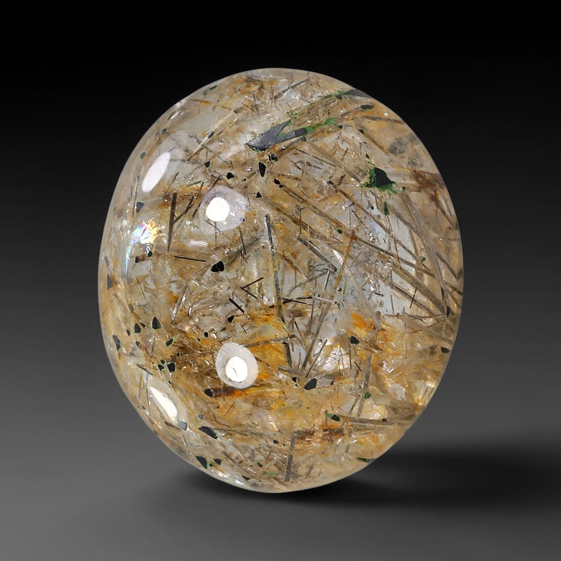 14.02ct Natural Brazilian Black Rutile Quartz Cabochon Loose Gemstone, 1YX: This polished cabochon of natural rutile quartz features countless distinct slender black rutile needle inclusions suspended within the clear quartz host crystal. The smooth domed surface enables full