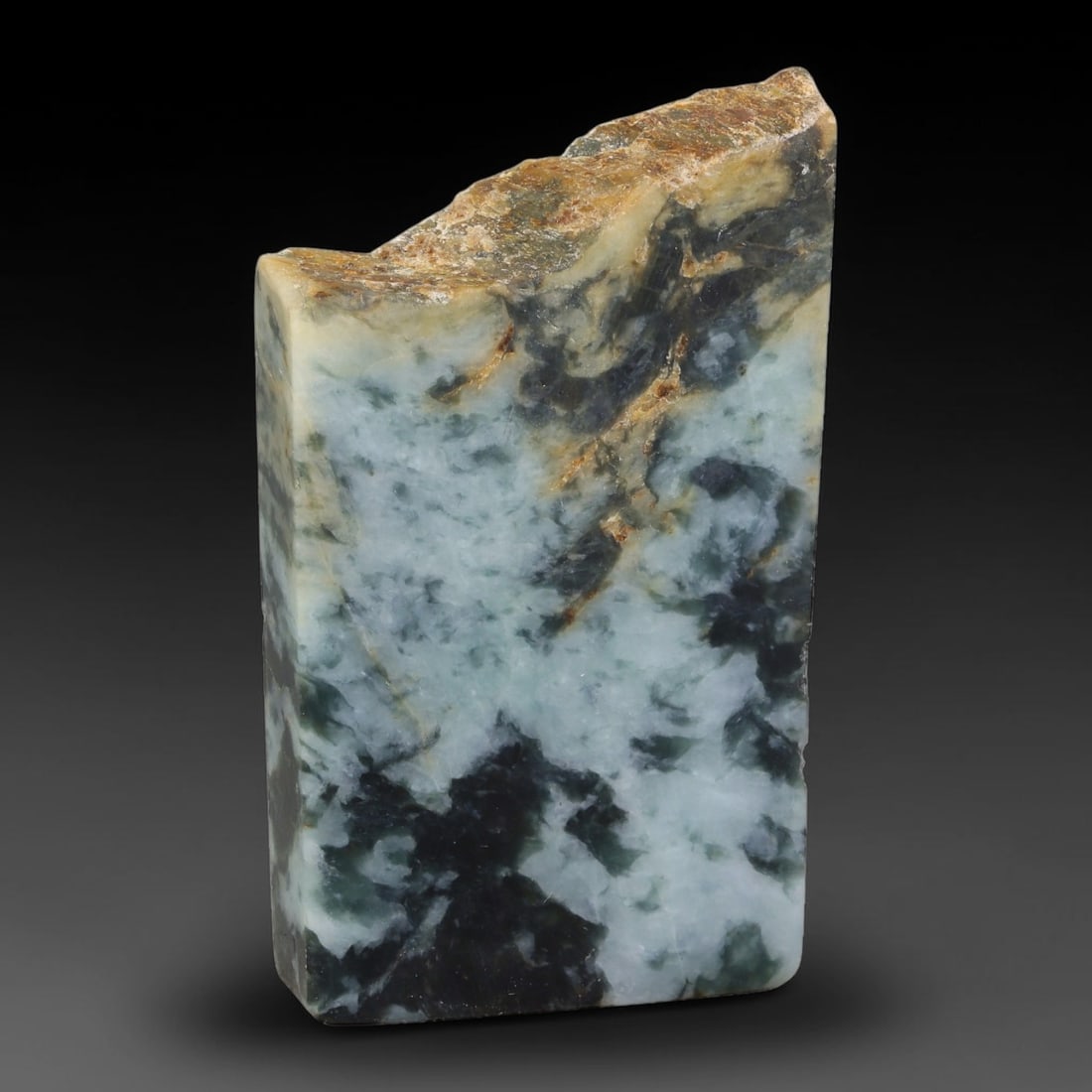 305ct Natural Type A Burmese Jadeite Jade Sliced Rough, 28YK: This specimen is a sliced rough block of natural Type A Burmese jadeite jade. The interior displays natural colour zoning with visible mineral veining and crystalline patterns typical of unprocessed j