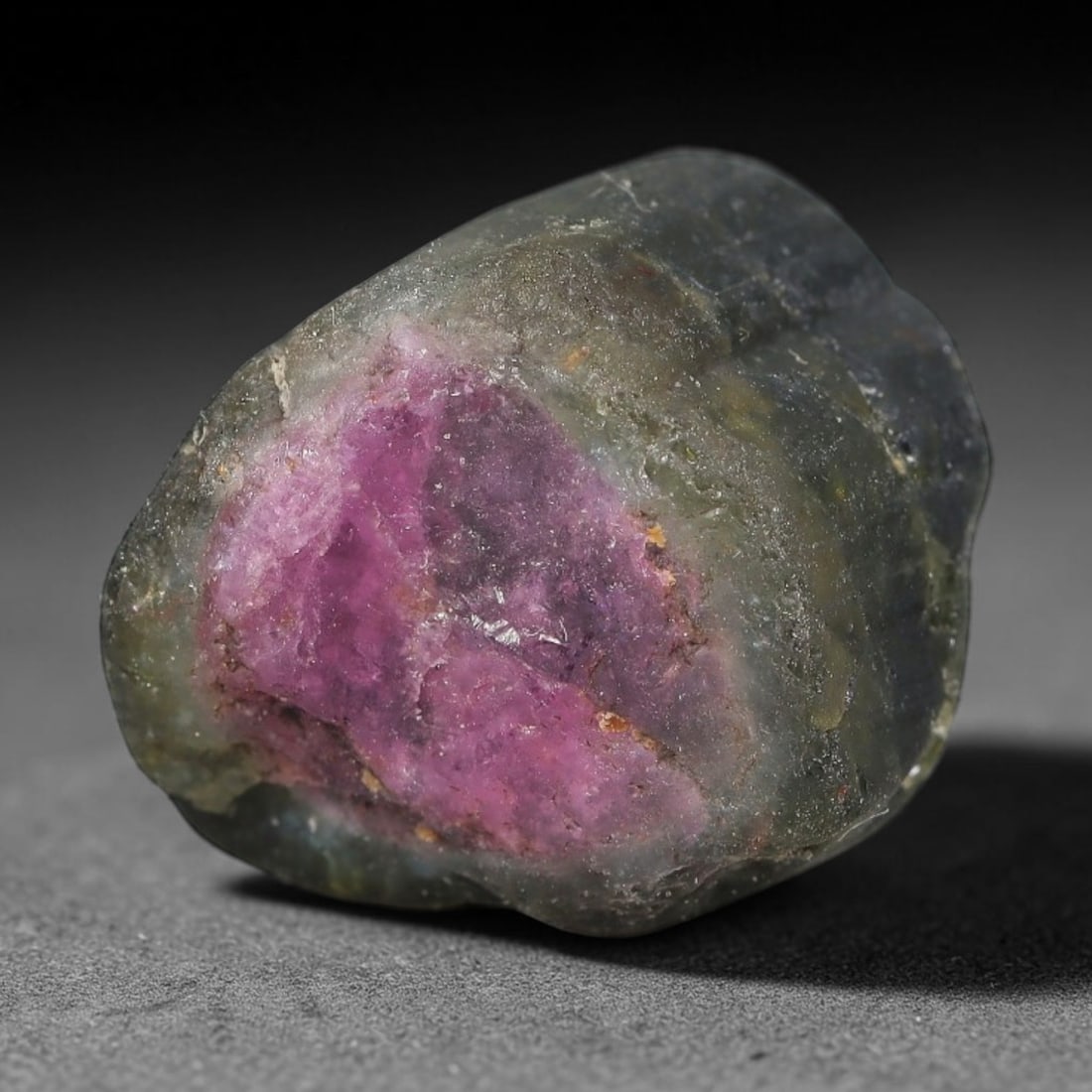 18 Carats Natural Pink Green Tourmaline Rough Specimen, 11YS: This is an untreated natural tourmaline mineral specimen formed by long-term geological activity underground, exhibiting blended pink and green color zoning throughout its crystalline composition. Nat