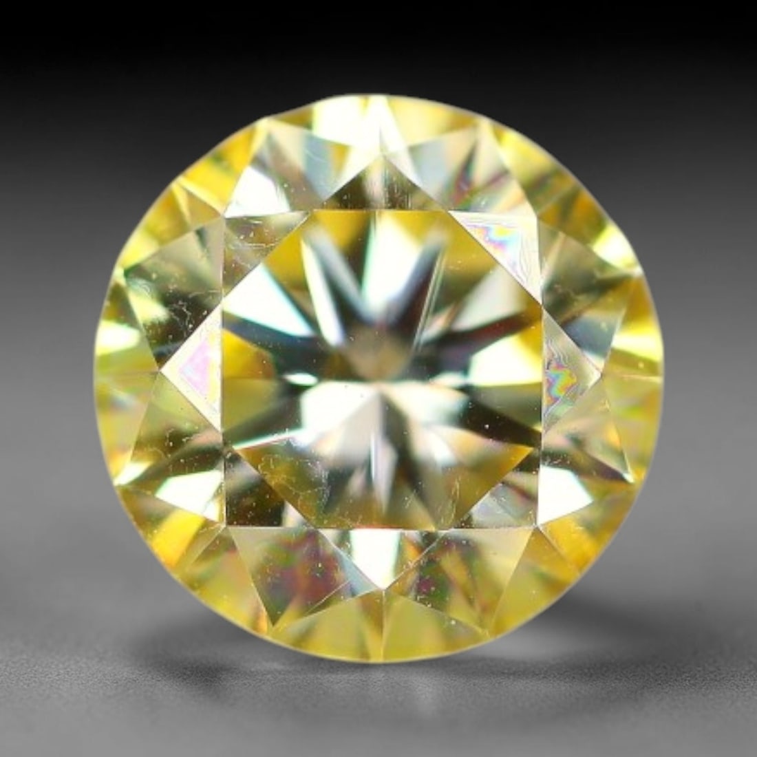 0.98 Carats Yellow Moissanite Loose Gemstone, 28WP: This yellow moissanite features dimensions of 6.4x3.9mm, crafted from high performance silicon carbide material famous for exceptional light refraction and brilliant light dispersion that creates inte