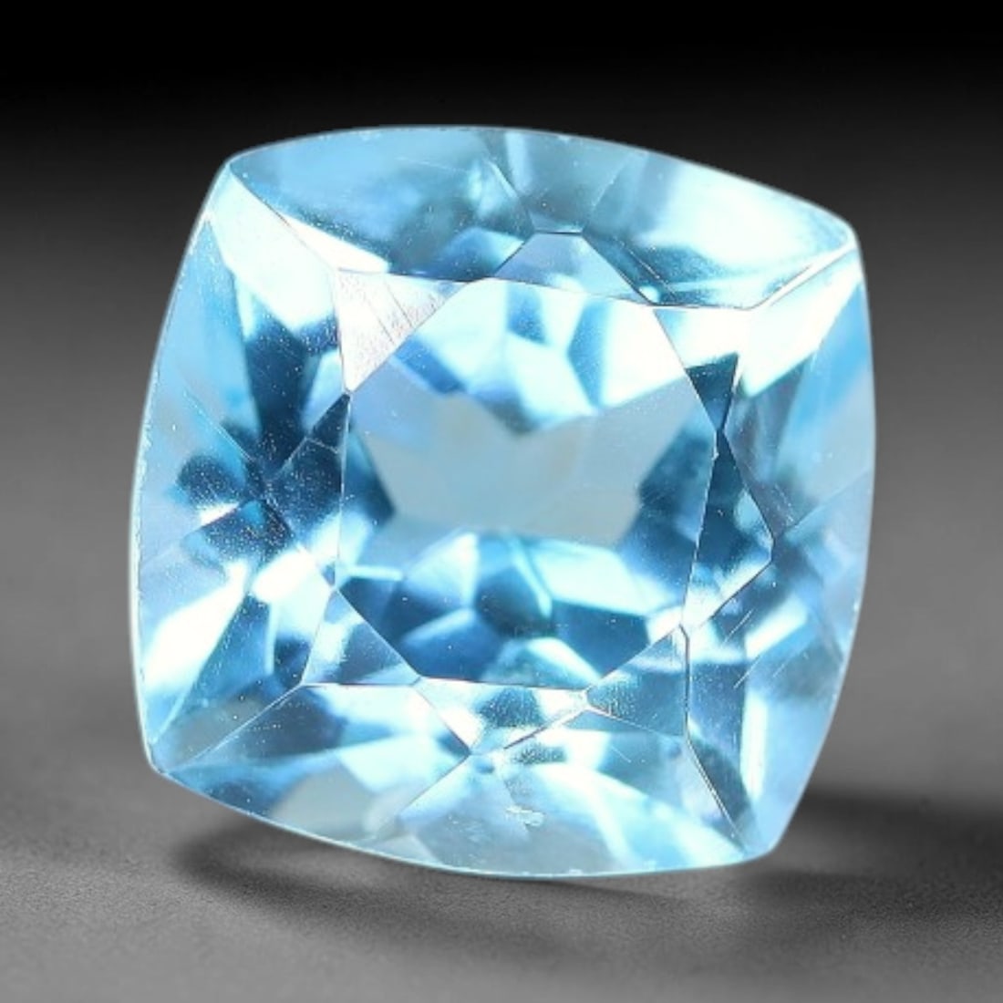 5.24 Carats Natural Brazilian Sky Blue Topaz Cushion Faceted Loose Gemstone, 32XY: Constructed from genuine natural topaz sourced from Brazilian mineral deposits, the raw material has been refined through professional faceted lapidary processing with consistent glossy polishing acro