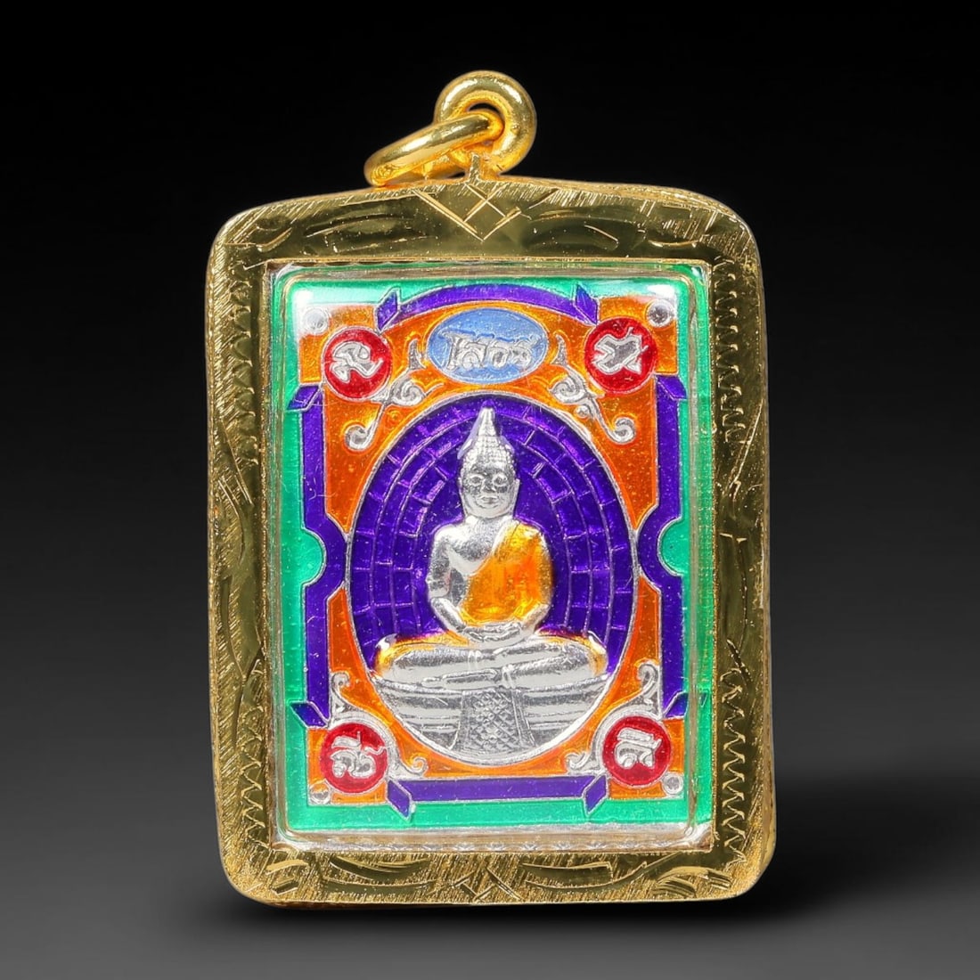 Thai Enamel Plated Metal Buddha Amulet - Buddhist Temple Pendant, 39YY: Constructed from silver tone plated base metal and fitted inside an ornately engraved gold plated metal casing with integrated top suspension loop for necklace wear. The front face features a central 