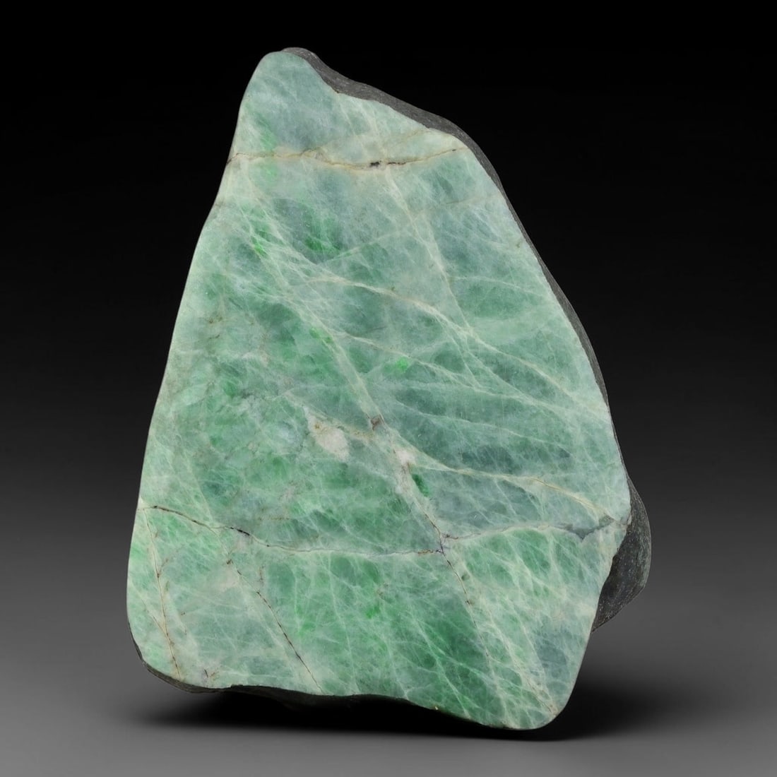 335ct Natural Type A Burmese Jadeite Jade Sliced Rough, 98YN: This specimen is a sliced rough block of natural Type A Burmese jadeite jade. The interior displays natural colour zoning with visible mineral veining and crystalline patterns typical of unprocessed j