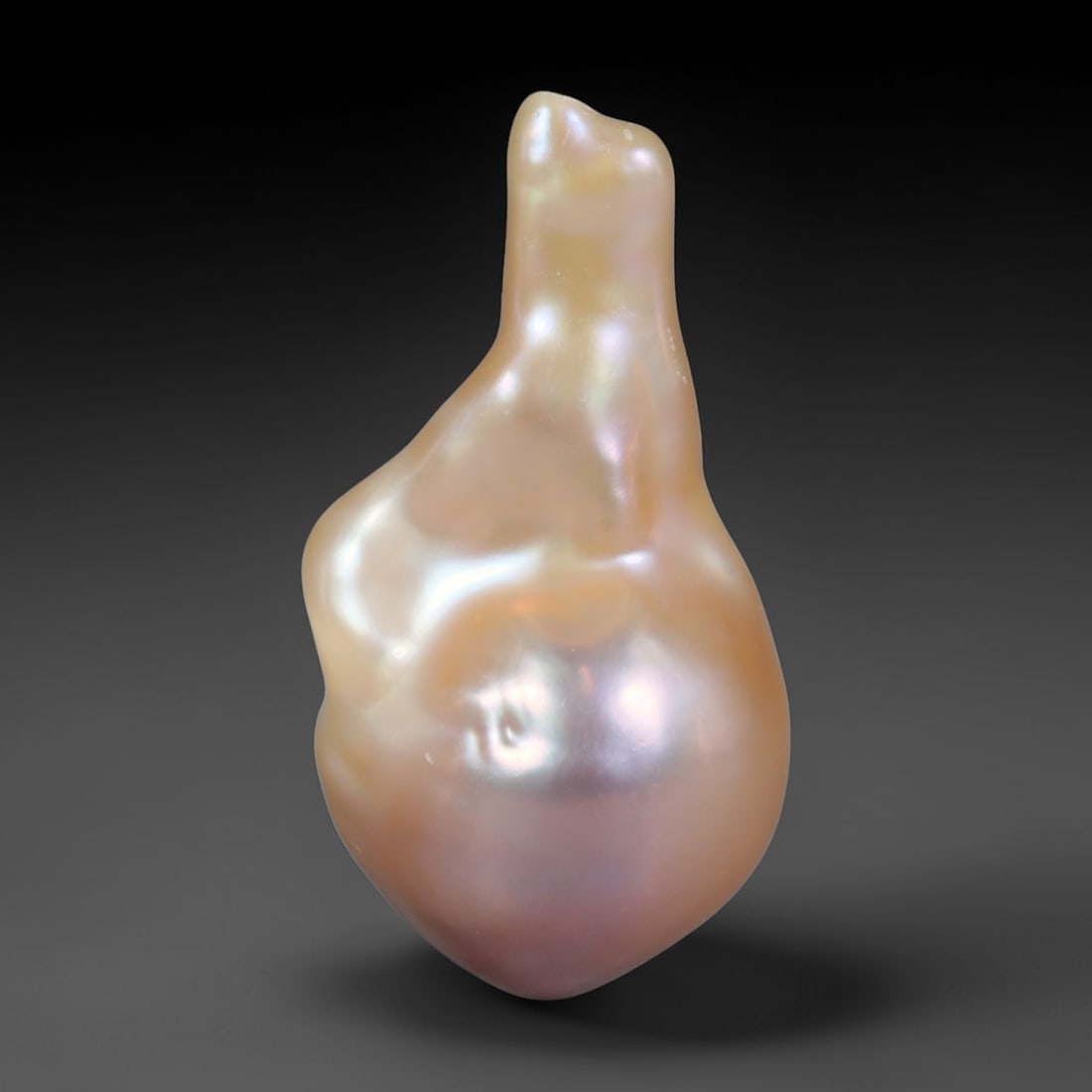 Natural Freshwater Keshi Pearl Baroque Loose Pearl, 91WE: This natural freshwater keshi pearl presents an organic irregular baroque silhouette with rich shifting iridescent nacre displaying soft champagne, peach and lavender overtones across its surface. Sub