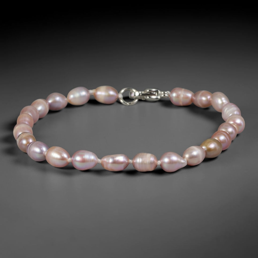 Natural Freshwater Pearl Bracelet - Baroque Lavender Blush Pearl Strand, 71YM: Strung from petite organic baroque natural freshwater pearls with soft lavender blush pearlescent iridescence, each bead displaying delicate asymmetrical oval and teardrop shapes formed through natura