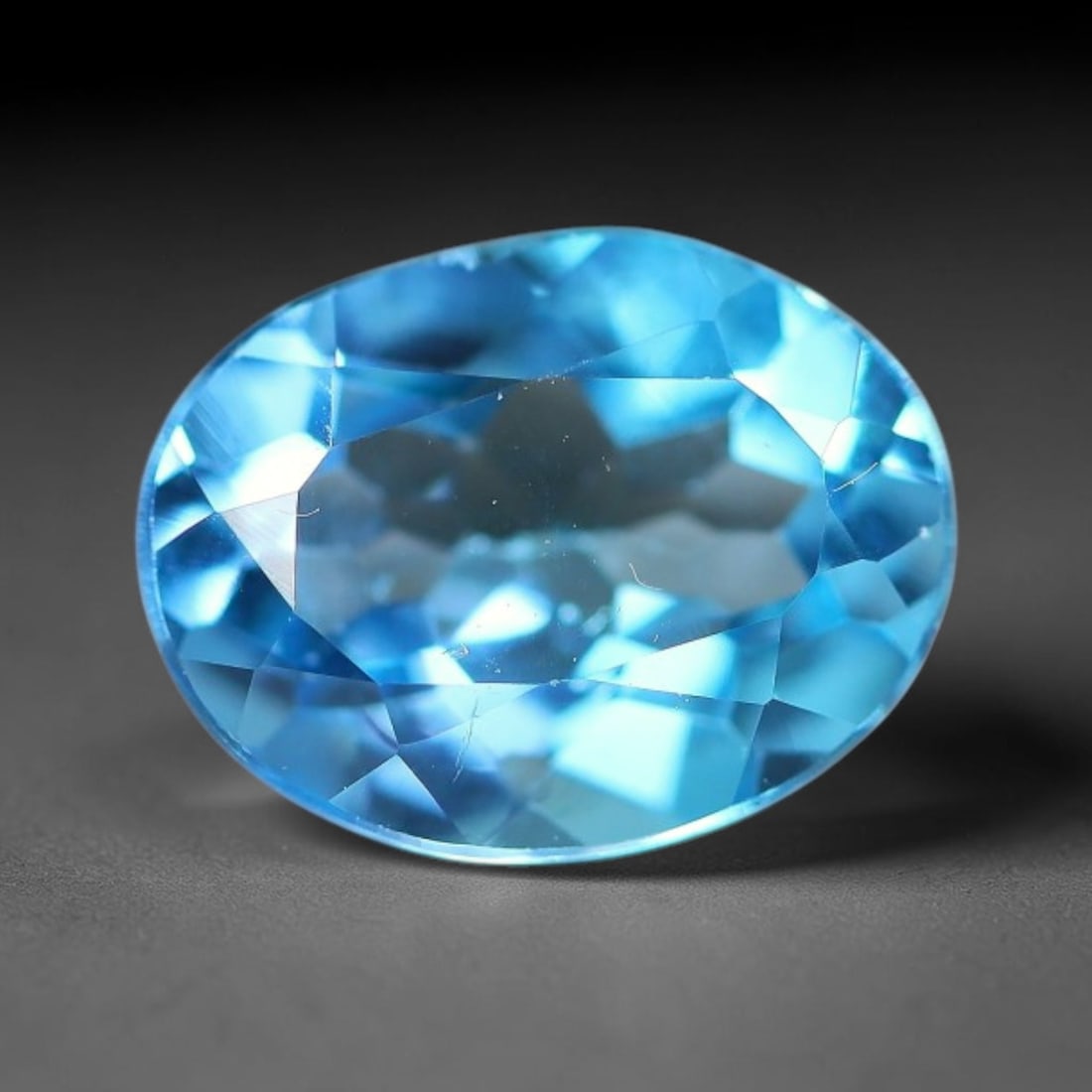 2.75 Carats Natural Swiss Blue Topaz Loose Gemstone, 7WP: This genuine natural swiss blue topaz displays consistent saturated blue coloration inherent to unprocessed natural mineral specimens. Formed through natural geological formation, the stone carries su