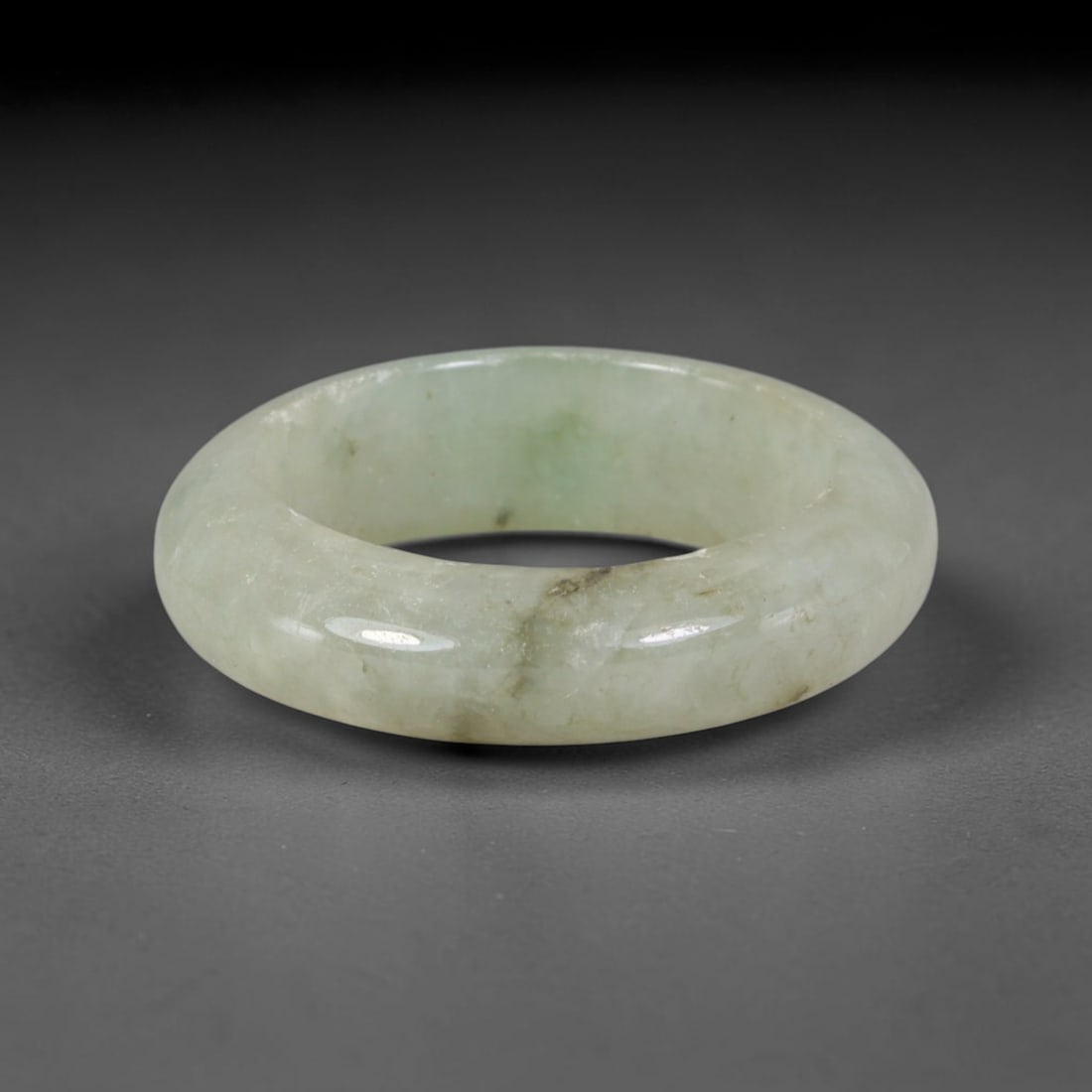 Natural Burmese Type A Jadeite Jade Band Ring Size US 10, 48TB: Crafted from untreated natural Burmese Type A jadeite jade, this solid stone band features a high-gloss polished finish displaying consistent deep green mineral tones interwoven with natural subtle to