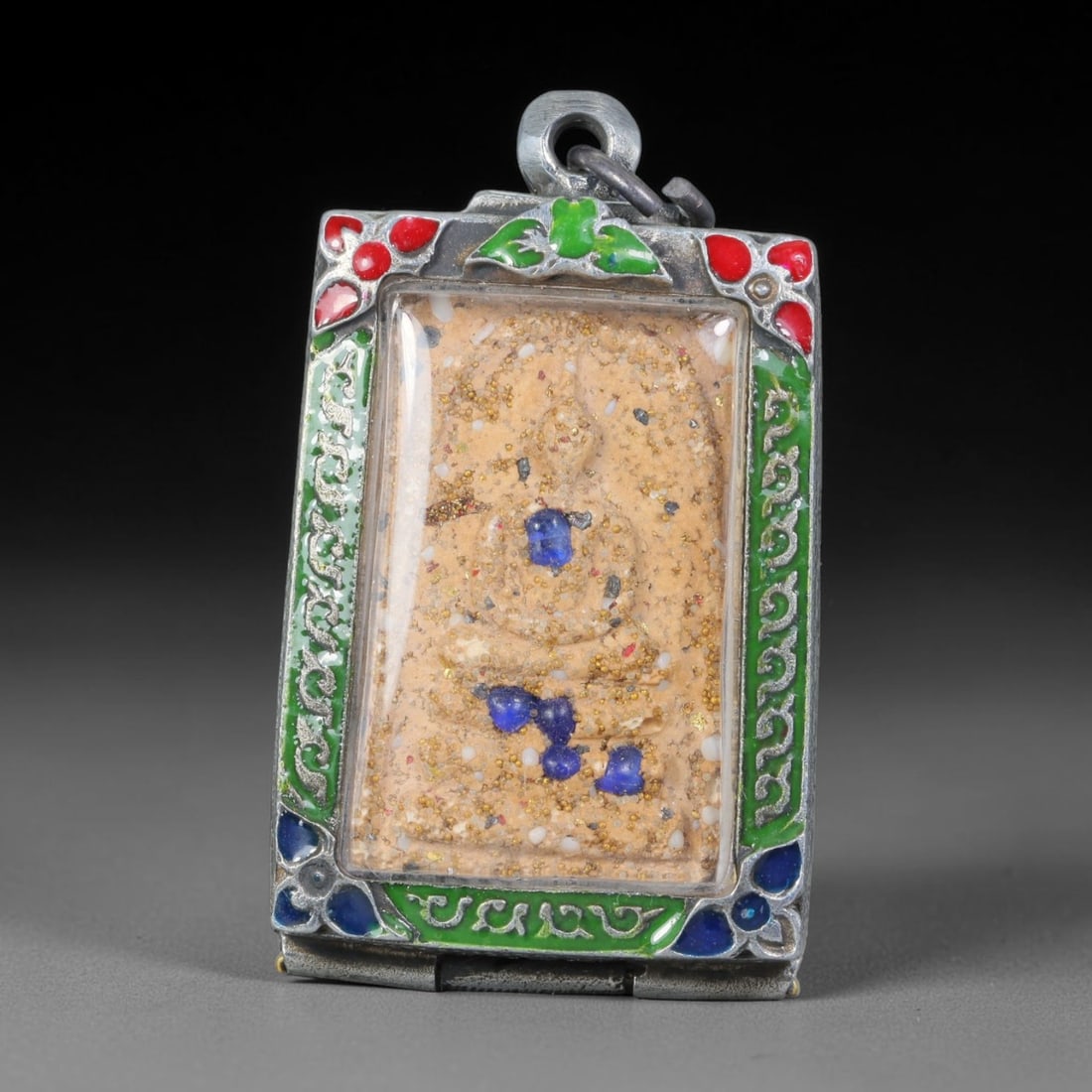 Thai Gilded Clay Metal Amulet Buddhist Votive Pendant, 20ZB: Formed from fired clay with applied gilded surface layers, the piece uses traditional molding techniques characteristic of Southeast Asian devotional craft. The construction adheres to standard region