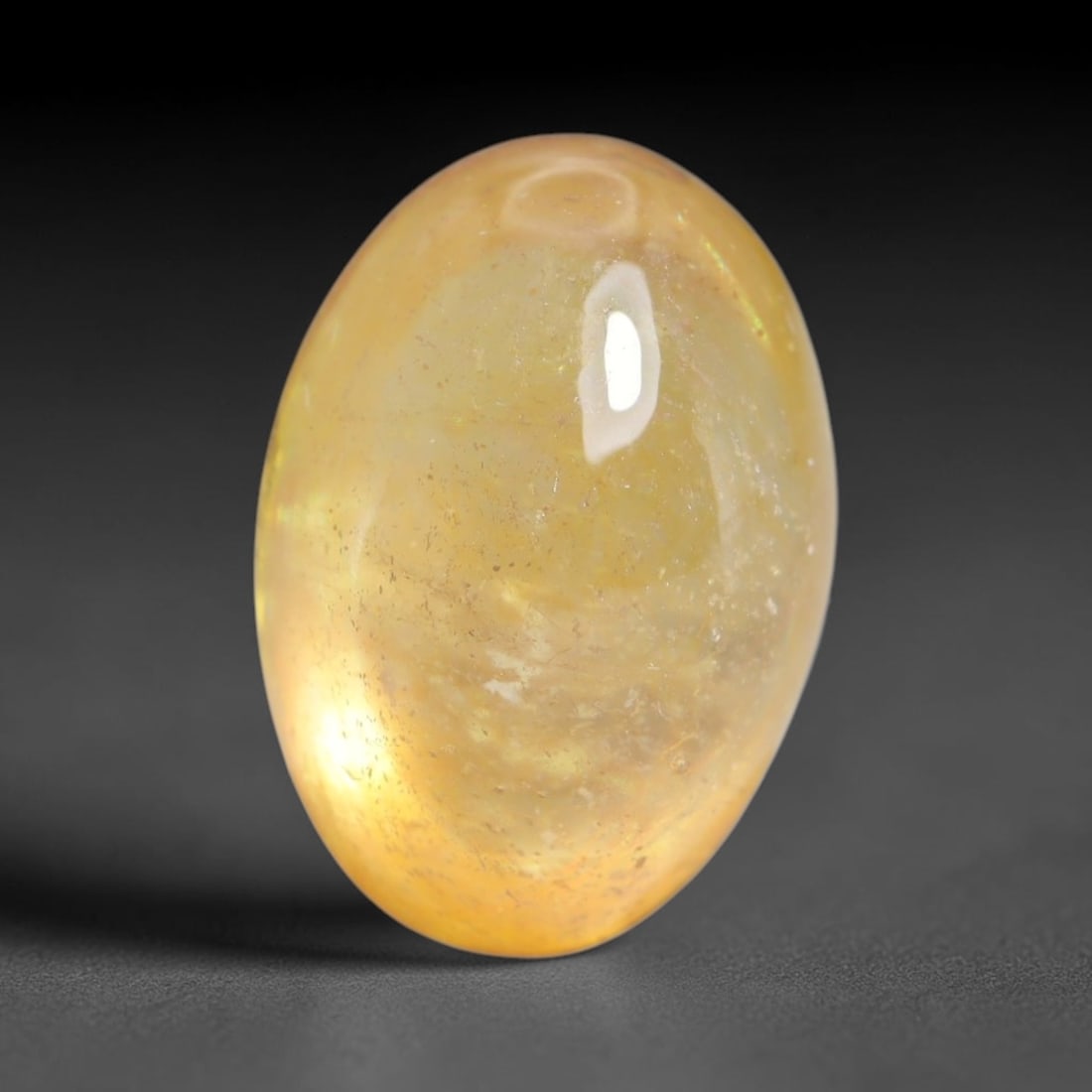 7.16 Carats Natural Madagascar Yellow Sapphire Cabochon Loose Gemstone, 92XY: Formed of natural corundum sourced from Madagascar geological formations, this raw mineral material is shaped and polished into a smooth cabochon form via professional stone processing techniques. Nat