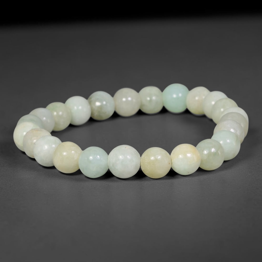 Natural Burmese Type A Multi-Tone Jadeite Jade Beaded Bracelet, 87TA: Crafted from untreated natural Burmese Type A jadeite jade beads with maximum bead dimension of 8.62mm, this wearable strand features a gentle polished finish displaying layered mixed natural mineral 