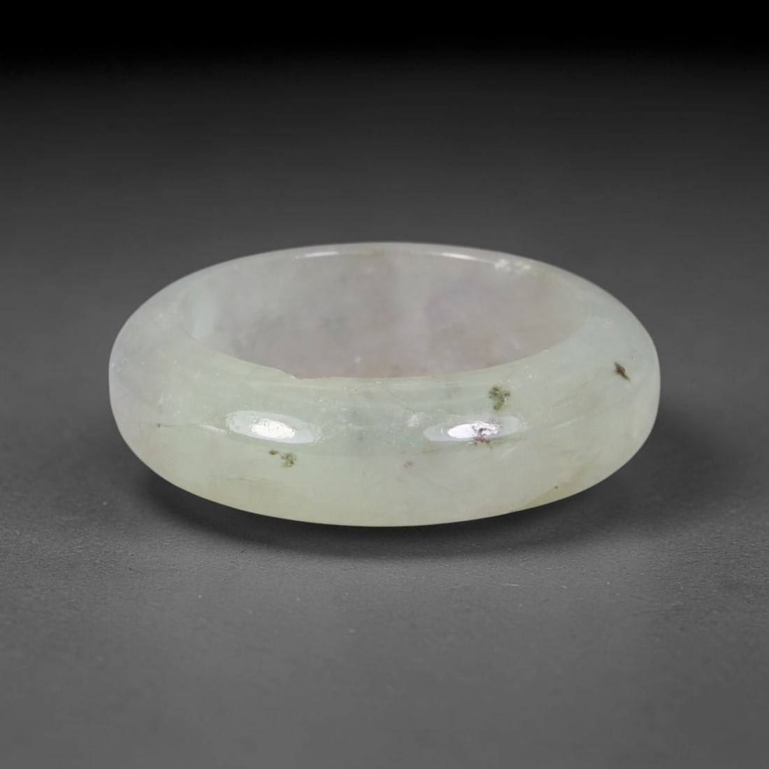 Natural Burmese Type A Jadeite Jade Band Ring Size US 9.5, 45TB: Crafted from untreated natural Burmese Type A jadeite jade, this solid stone band features a high-gloss polished finish displaying consistent deep green mineral tones interwoven with natural subtle to