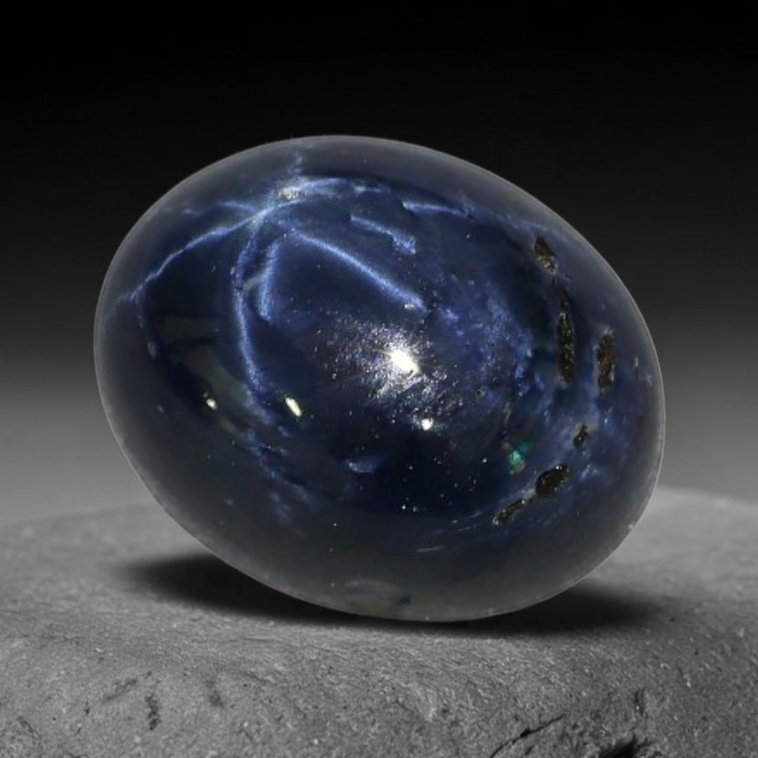 3.77 Carats Natural 6 Ray Blue Star Sapphire Loose Gemstone, 47XX: This star sapphire is crafted from natural corundum deposits and refined into a sleek polished cabochon form through professional lapidary finishing procedures. The distinct six-ray star asterism disp
