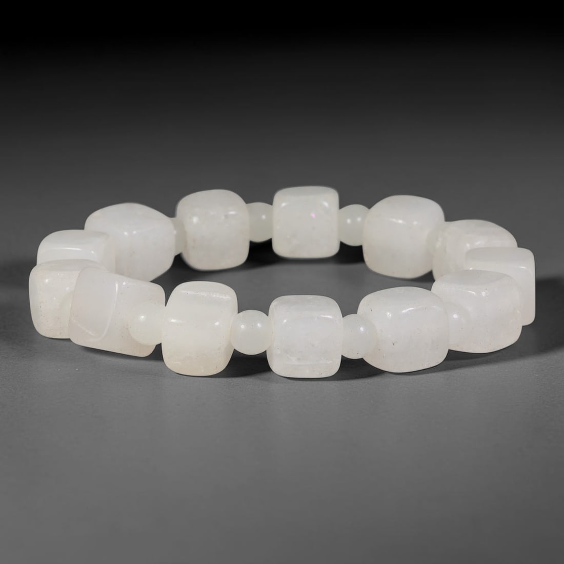 Natural Milky White Square Cube Jadeite Beaded Bracelet, 22TA: Handcrafted bracelet featuring smooth rounded square cube untreated natural Burmese Type A jadeite beads, paired with tiny matching milky white jadeite spacer beads between each block. The stones show