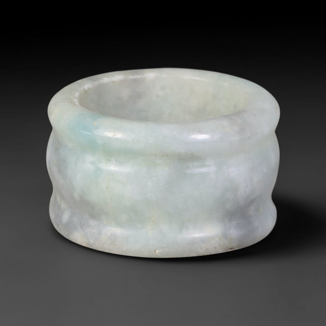 Natural Burmese Type A Jadeite Jade Band Ring Size US 9.50, 7TB: Fashioned from untreated natural Burmese Type A jadeite jade, this solid stone band carries a smooth polished finish showcasing milky pale base tones blended with soft natural green mineral undertones